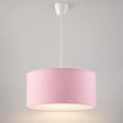 Suspension enfant en tissu, abat-jour tambour pastel allumé sur fond neutre clair