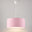 Suspension enfant en tissu, abat-jour tambour pastel allumé sur fond neutre clair
